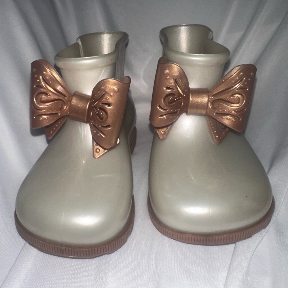 Mini Melissa Cream Boots with Bronze Bow